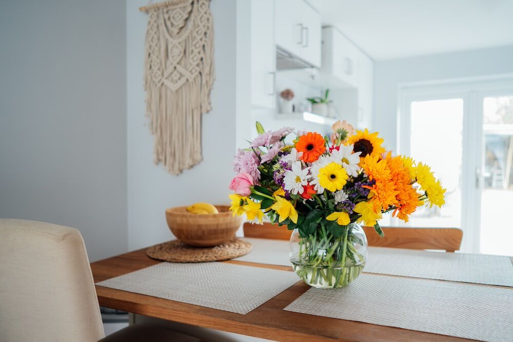 Freshly cut spring flowers arranged on a table