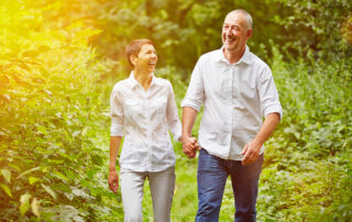 Senior couple happy and walking outside