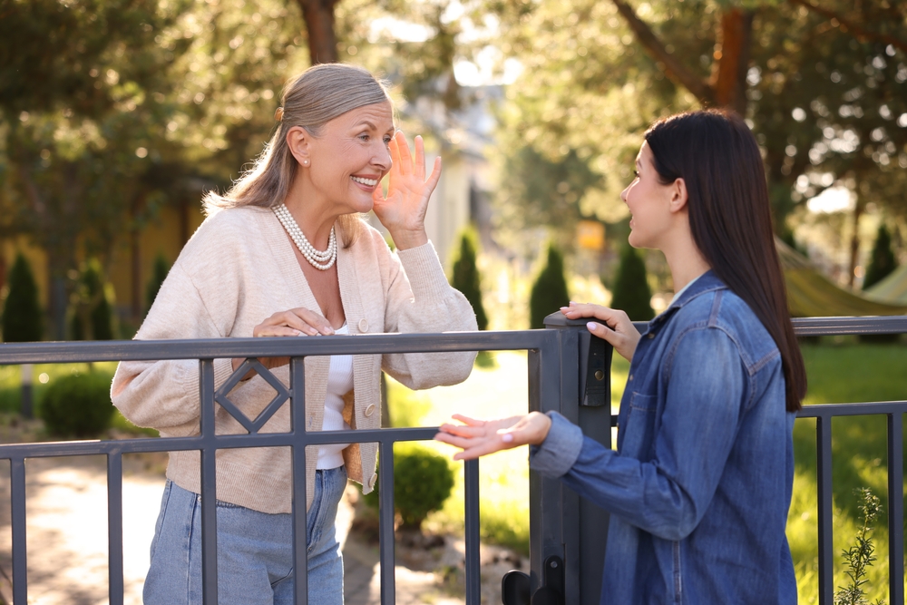 Senior and mother outdoors in assisted living near Visalia, CA.