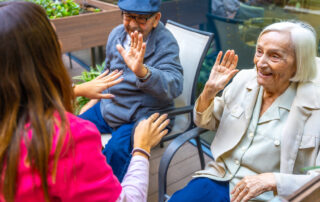 Seniors with nurse in memory care Carlsbad.