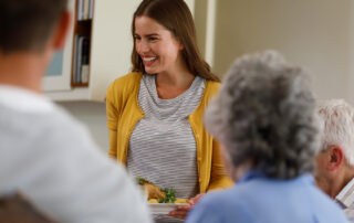 Smiling nurse in assisted living in Oceanside.