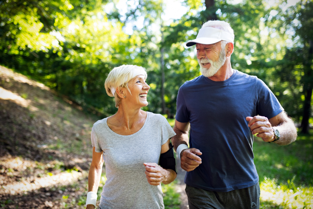 Couple walking in senior living near Carlsbad.